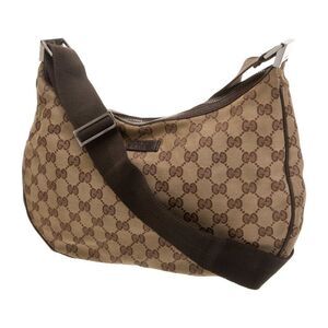 Used in good condition Gucci
GG Canvas Messenger Bag